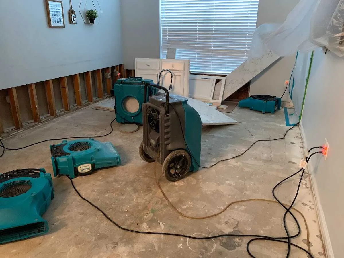 Dehumidifier in flood-cut room for Water Extraction & Removal in Milford