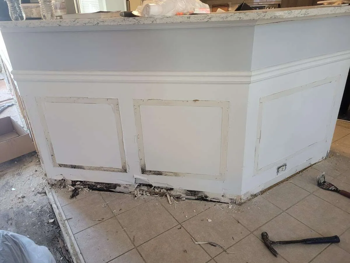 Water damage and mold on kitchen during Storm Damage Restoration in Milford